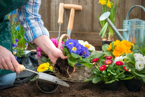 Auditor reviewing supplier documents in a garden services office